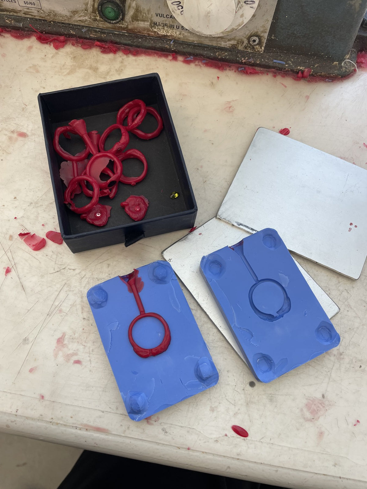 Wax models and rubber molds prepared for casting