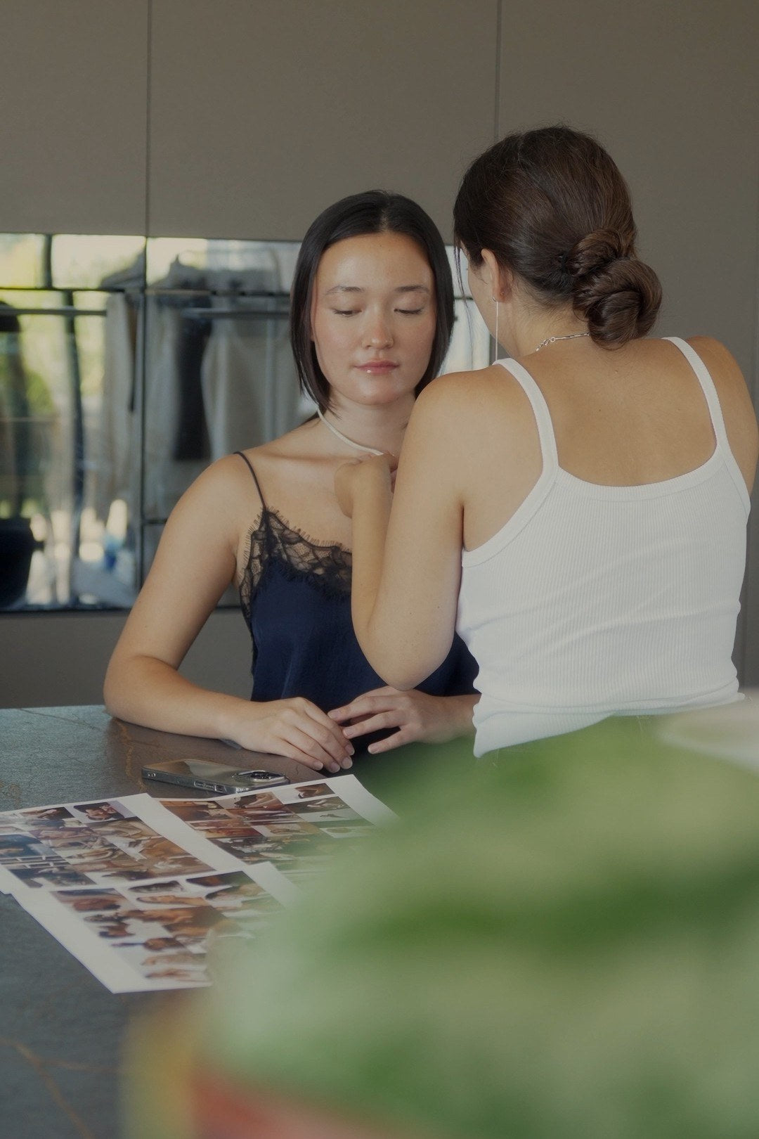 Reviewing photographs together in the studio