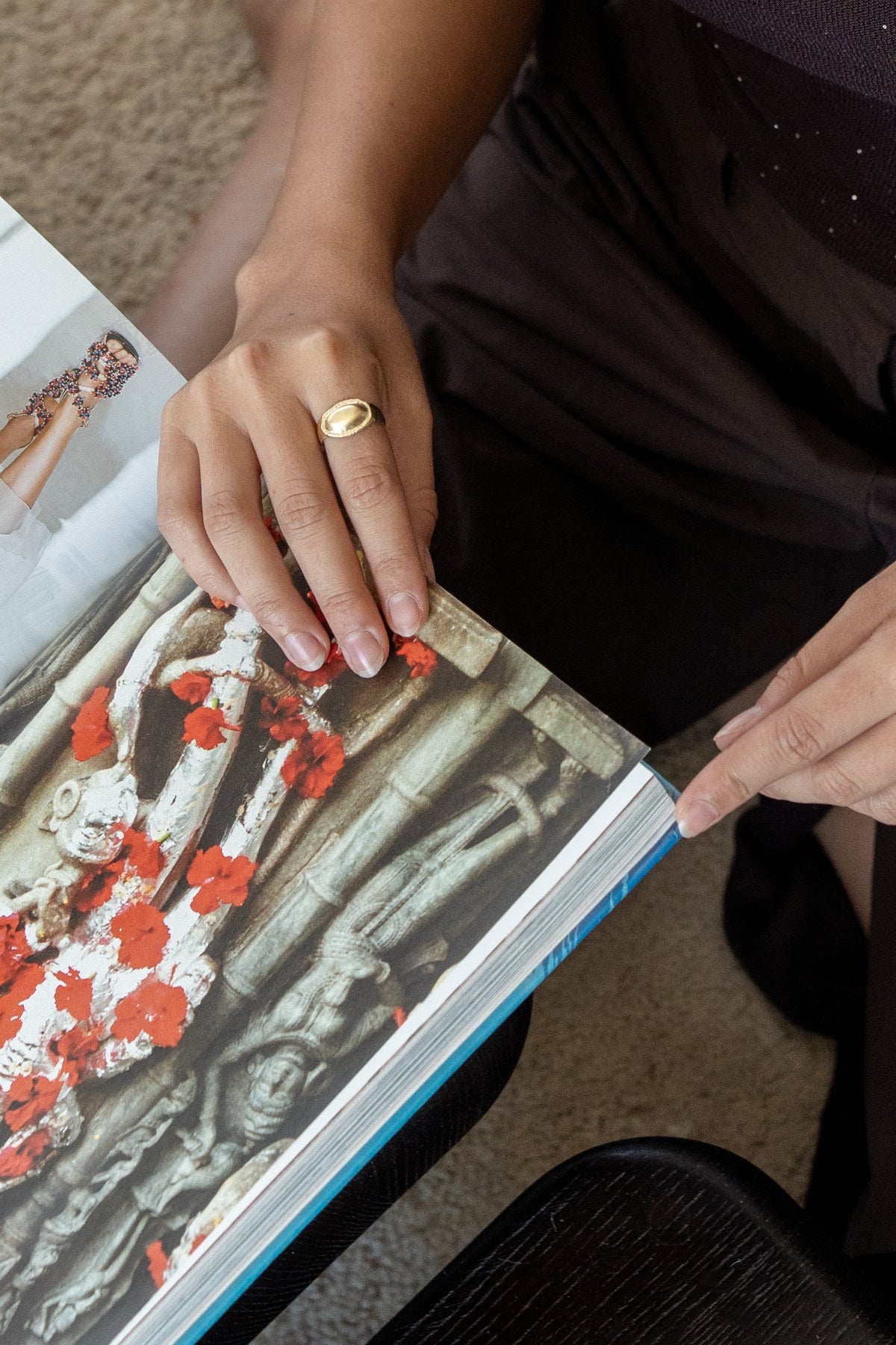 Jewelry and an art book in the studio