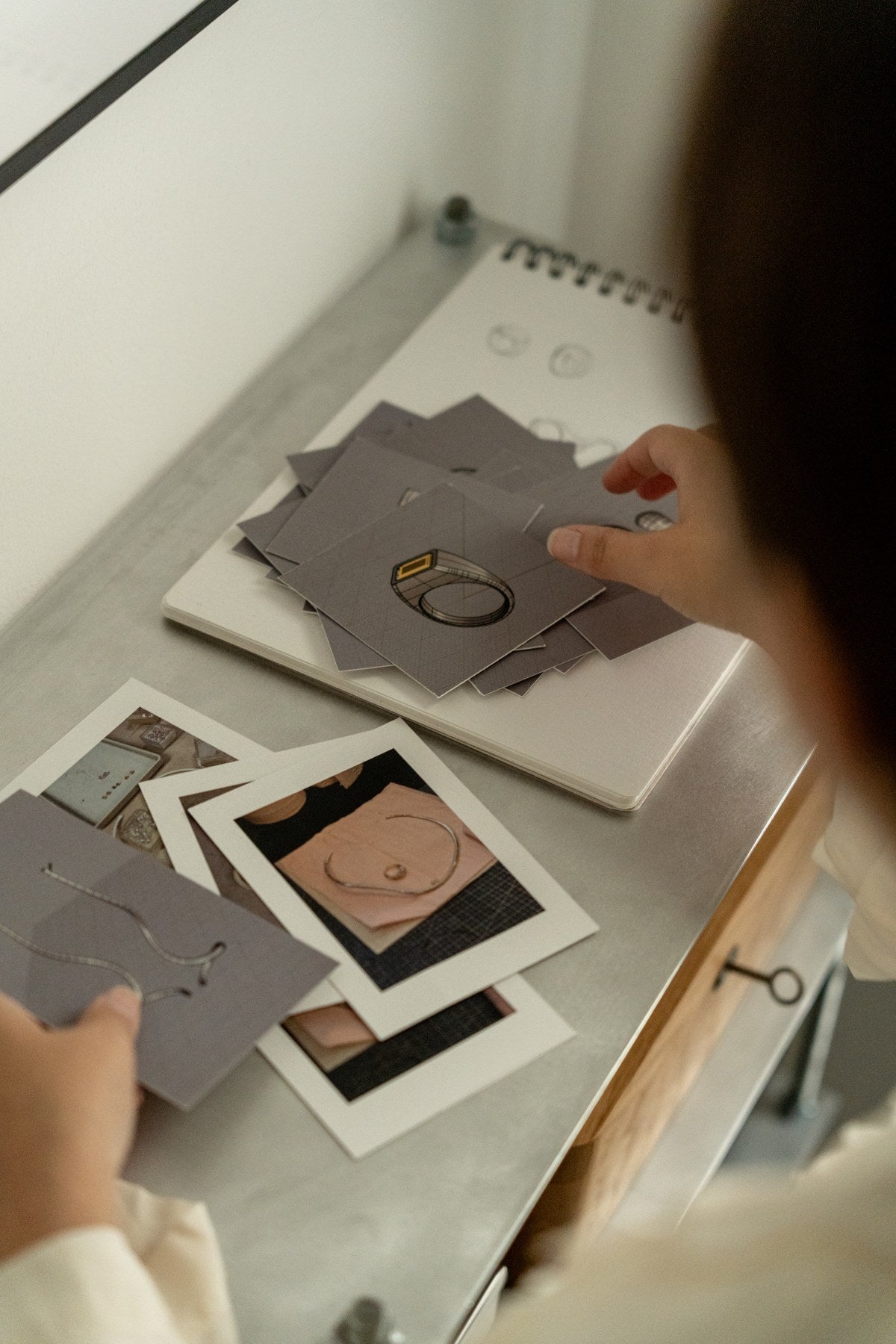 Selecting jewelry designs with printed photographs