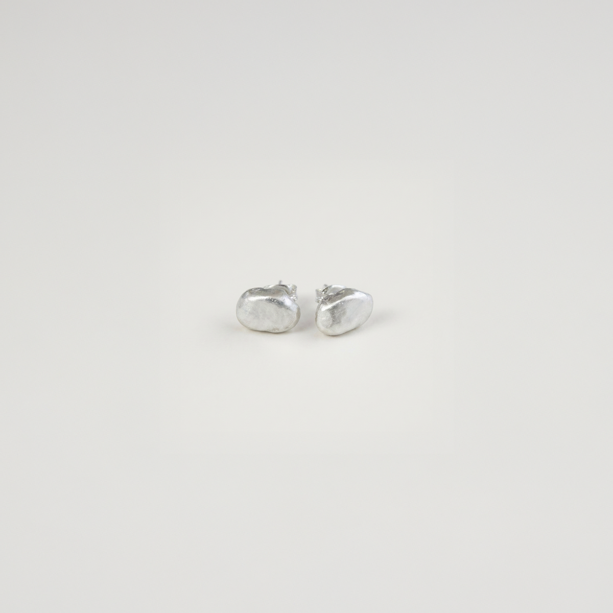 Boten earrings in sterling silver — handmade jewelry by BARSHA STUDIO