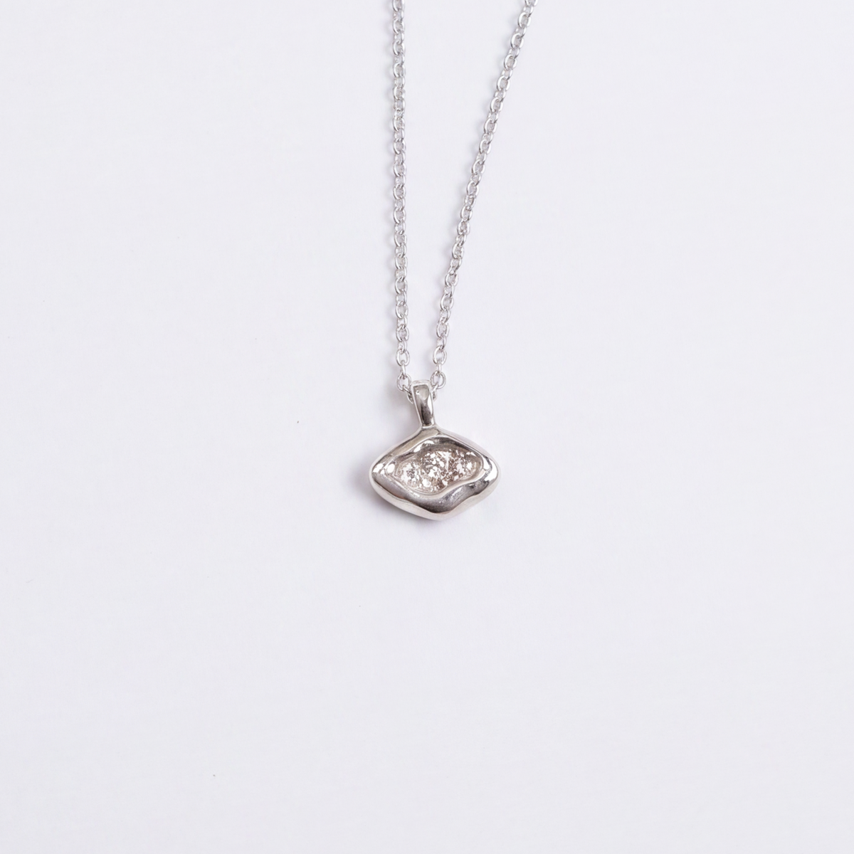 Eye necklace in sterling silver — handmade jewelry by BARSHA STUDIO
