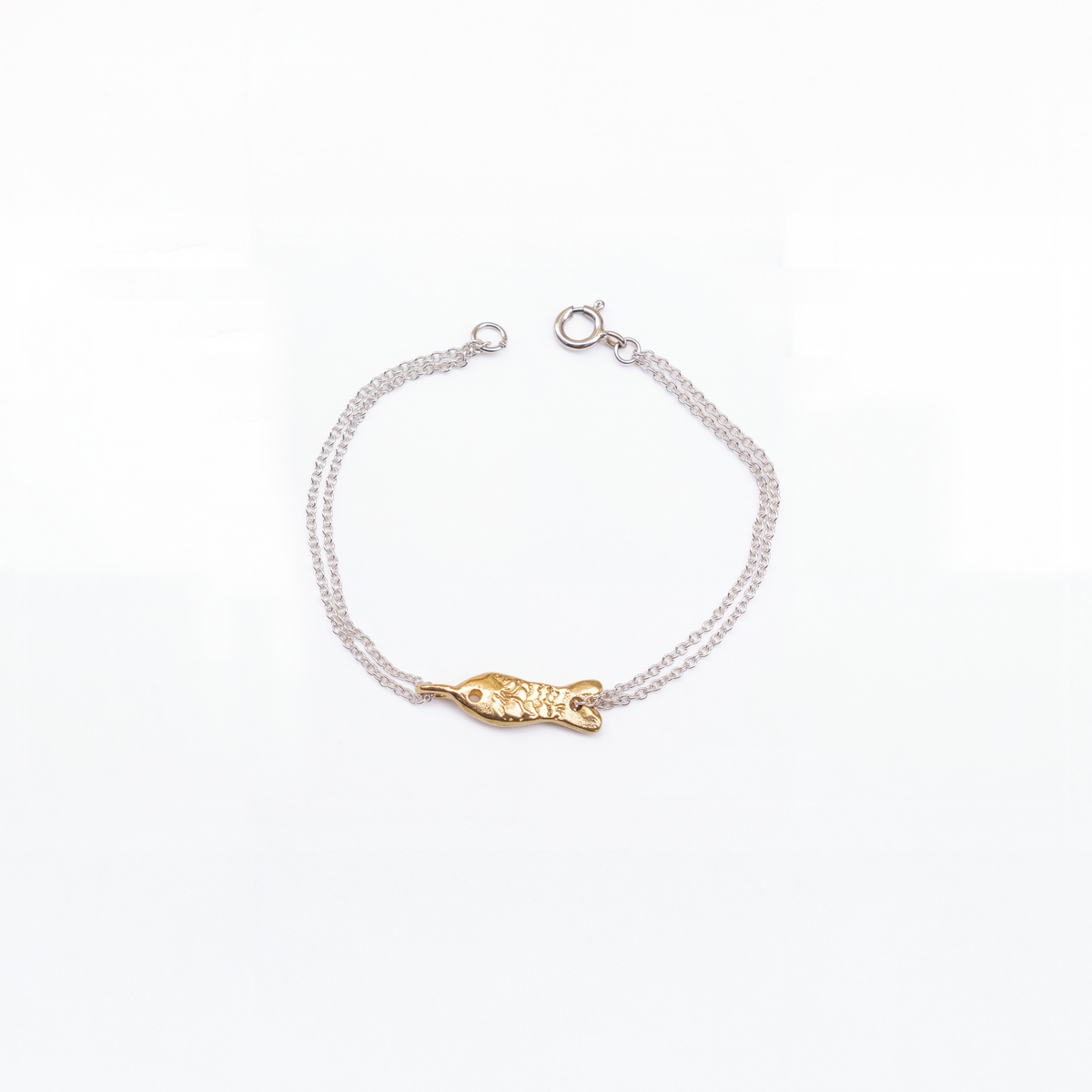 Fish bracelet in sterling silver, textured fish design — handmade jewelry by BARSHA STUDIO