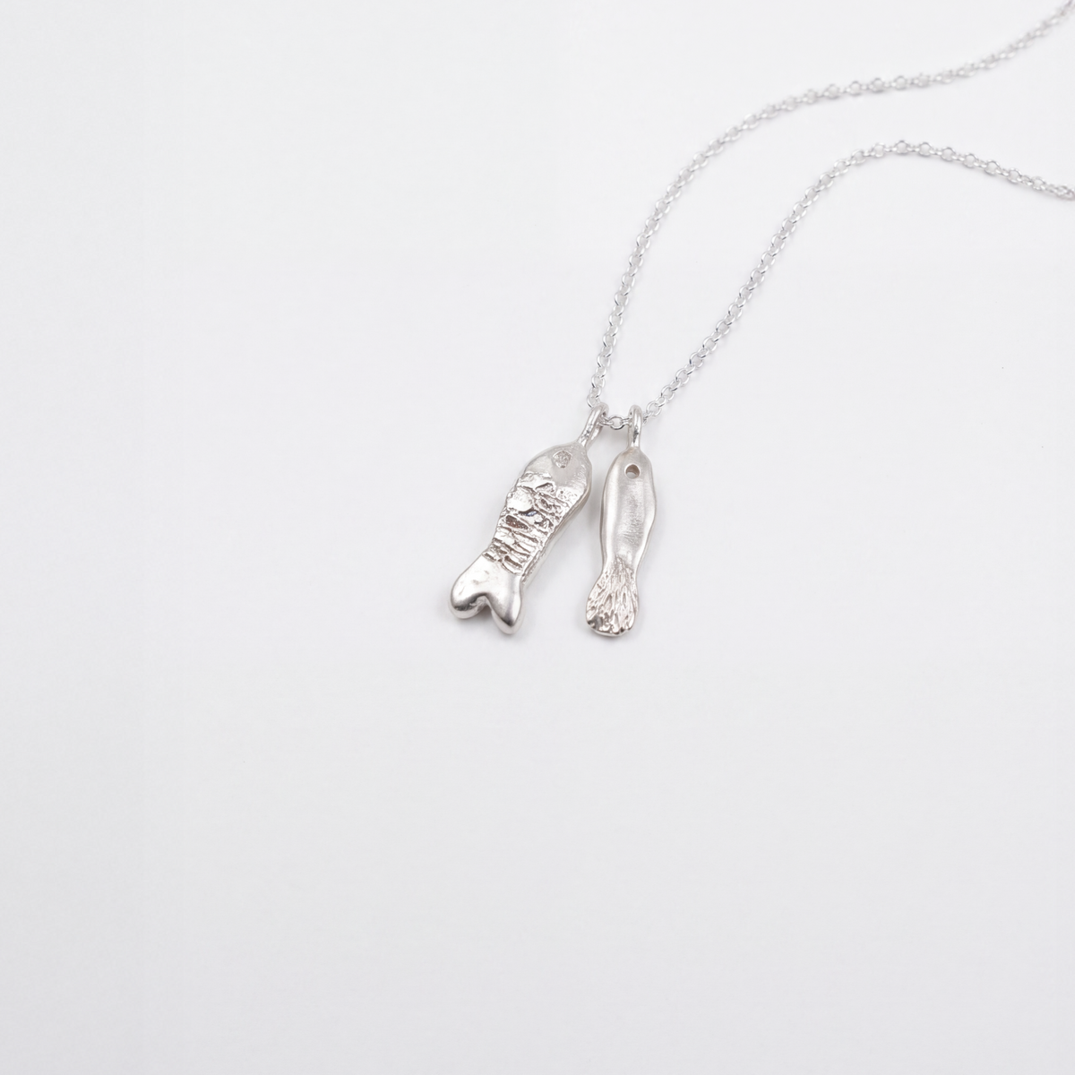Fish necklace in sterling silver — handmade jewelry by BARSHA STUDIO